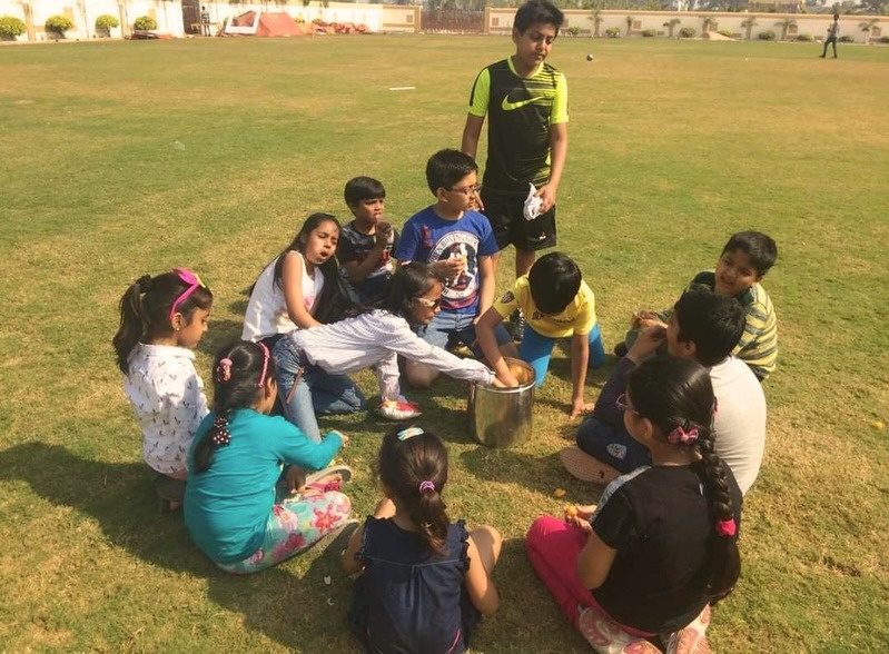 Children working together on a scavenger hunt